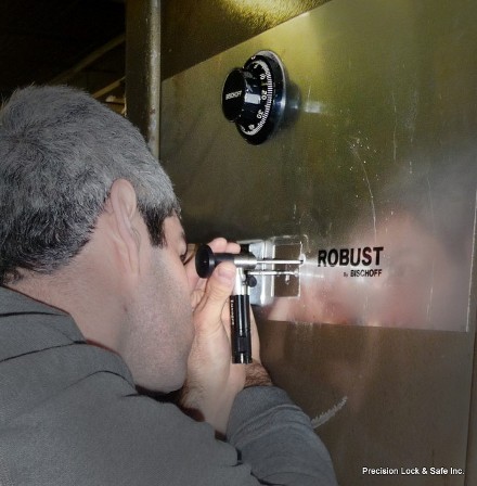 safecracker viewing internal mechanism of safe (safe opening)