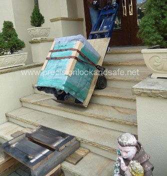 Delivering the Restored Safe on the stairclimber (safe moving)